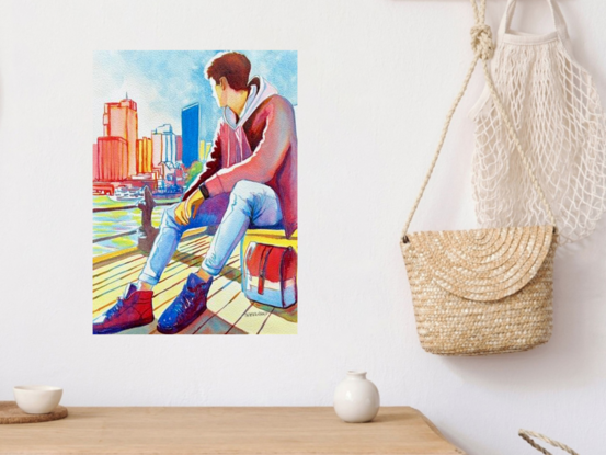 "City Daydreams" by Christine Beard is a vibrant watercolor that captures a young man in a reflective pose, gazing out at a bustling city skyline. The artist masterfully blends bright, bold colors to depict the urban environment, while the figure's relaxed posture and thoughtful expression convey a sense of contemplation. This artwork beautifully balances the energy of the city with the calm introspection of the individual, making it a compelling piece for those who appreciate contemporary figurative art and urban landscapes.





