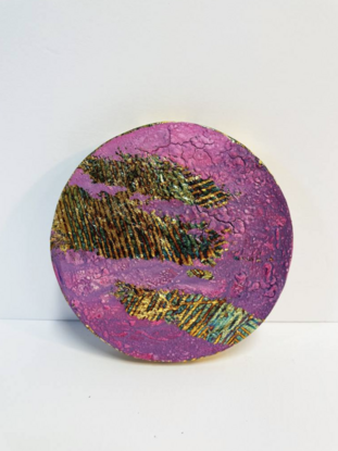 three circular abstract paintings in shades of pink and purple with elements of variegated gold