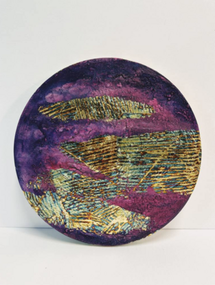 three circular abstract paintings in shades of pink and purple with elements of variegated gold