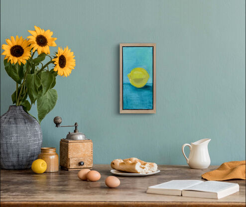 yellow lemon on turquoise bench 