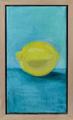 yellow lemon on turquoise bench 