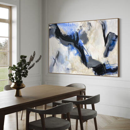 bold marks in warm earthy beige and dark blue across the canvas suggestive of when the landscape meets the water made from large expressive marks with pops of light blue and black line work on a white canvas