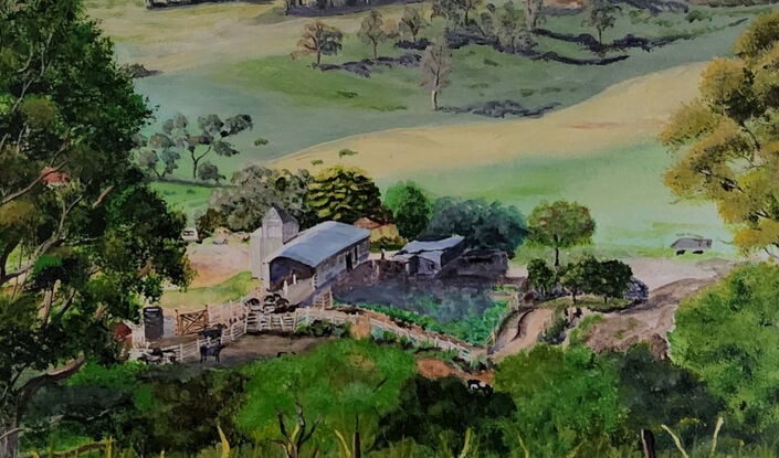 a panoramic view to the misty mountain ranges in the distance and the rolling hills of Bega Valley, with homes scattered around, surrounded by grasses, shrubs and trees with a working farm in the foreground and tall grasses and a hint of a fence in front, all framed by two large gum trees on either side of the artwork