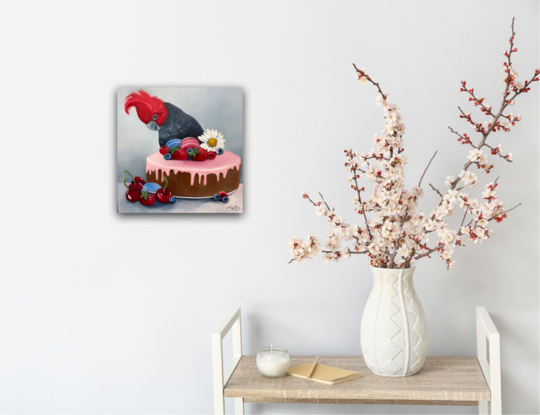 Gang Gang cockatoo with cake and fruit. 