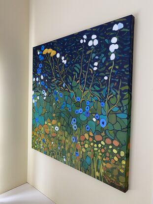 abstract garden with yellow, orange and blue flowers