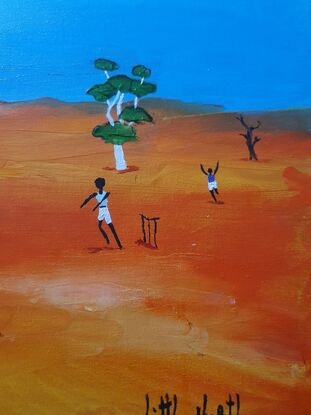 Kids playing cricket in the remote Outback.