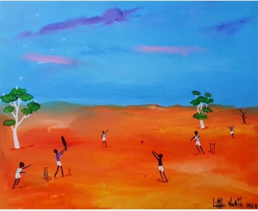 Kids playing cricket in the remote Outback.