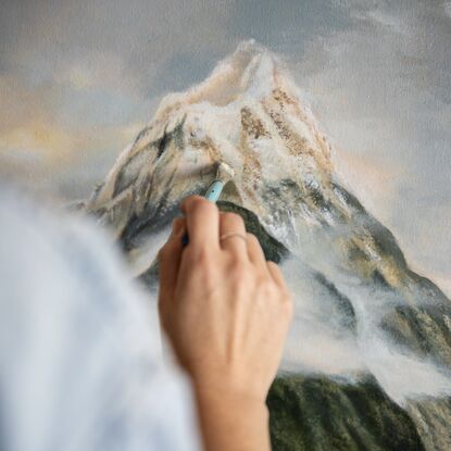 Detailed landscape of mountains in Milford sounds in New Zealand with water reflections 