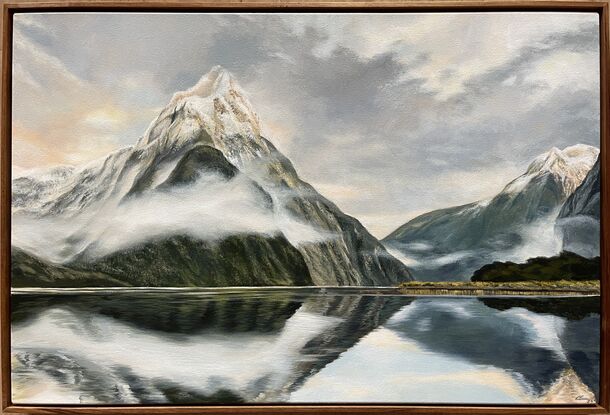 Detailed landscape of mountains in Milford sounds in New Zealand with water reflections 