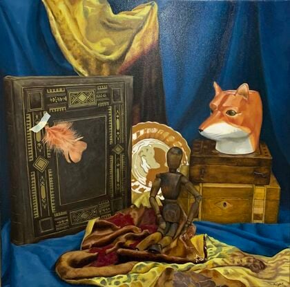 Fox, feather and mannequin still life on gold cloth 