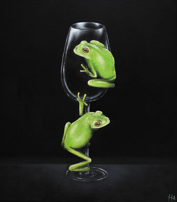 Two green tree frogs on a wine glass with a black background.