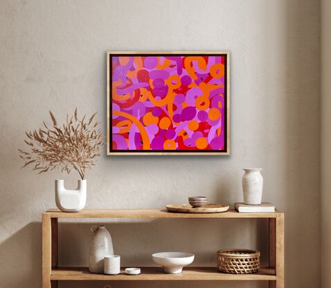 Bright pink, red and orange placed together in bold shapes 