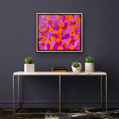 Bright pink, red and orange placed together in bold shapes 