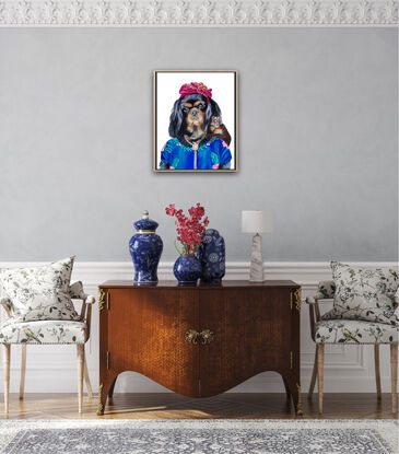 Cavalier King Charles spaniel painted in the likeness of Frida Khalo. 