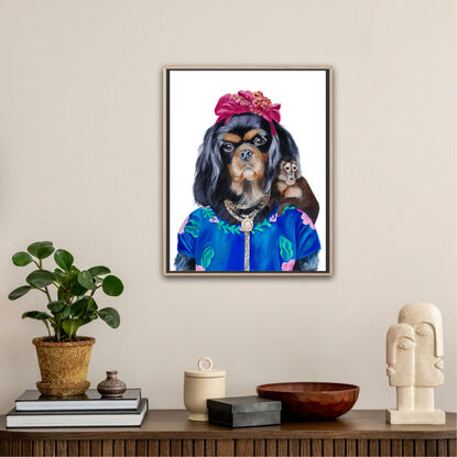 Cavalier King Charles spaniel painted in the likeness of Frida Khalo. 