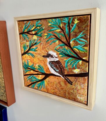 Kookaburra in golden bush
This painting is slightly varnished and framed with natural wood great quality.
Premium Linen
Birds are my cup of tea at this moment..I choose to work with metal leaf for the background there is a magical effect when light changing .
Kookaburra are so special and powerful..it was a pleasure to work on this one !
Each painting is provided with a certificate of authenticity.
Wrapped securely with bubbles layers and thick cardboard.ready to hang with D rings
