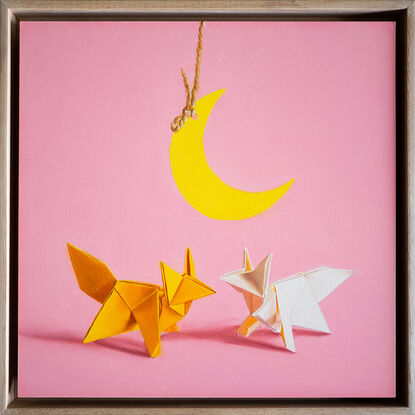 two origami foxes meeting under a hanging paper moon. the mood is fun and playful