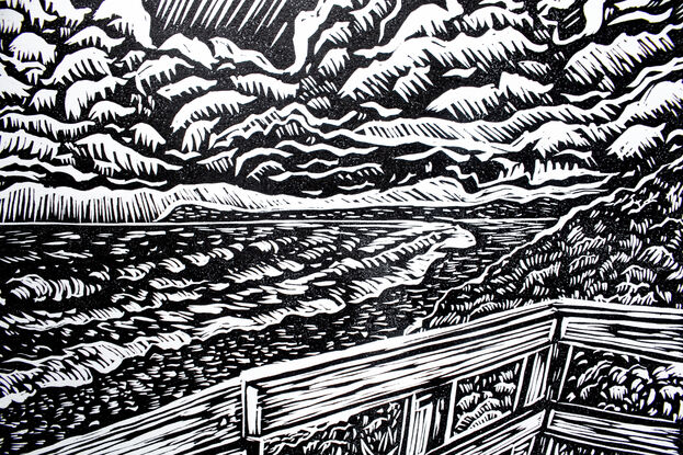 Linocut print of a beach and seascape