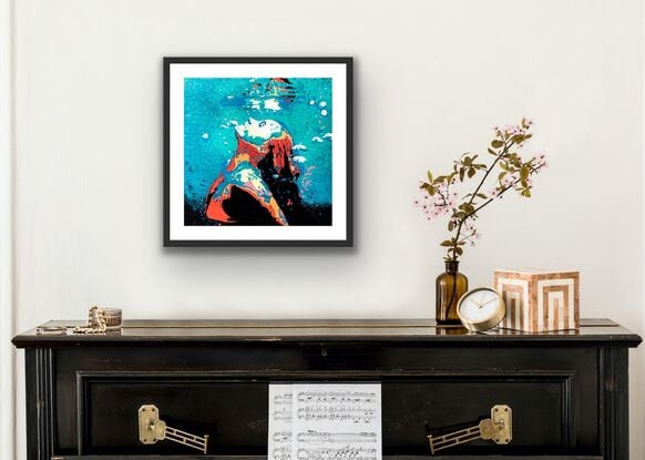 Woman underwater in bikini with uplifted face swimming towards surface of water.