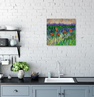 against a background of abstract skies and purple ranges are some brightly coloured orange and red poppies popping up out of a landscape of fields of greens 