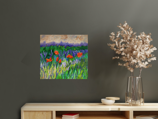 against a background of abstract skies and purple ranges are some brightly coloured orange and red poppies popping up out of a landscape of fields of greens 