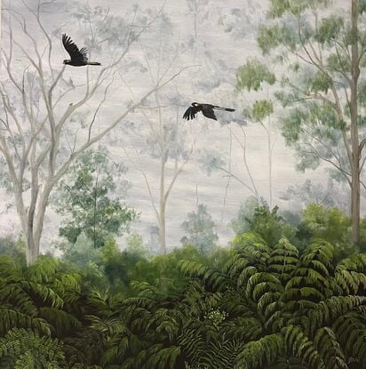 Black cockatoos fly over gum trees and tree ferns on a cloudy day