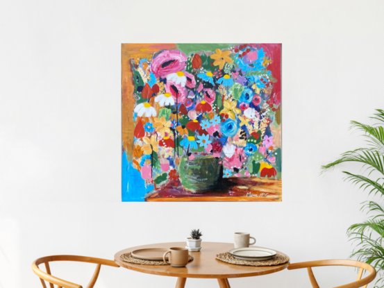 Coloured flowers in a vase on the kitchen table