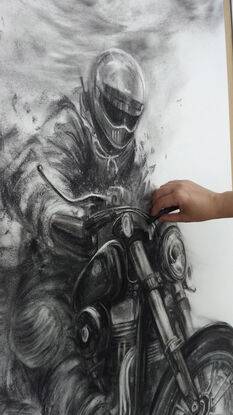 Charcoal Drawing of a motorcycle rider.