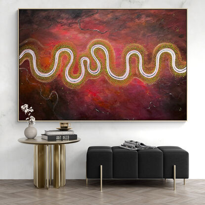 Colourful moody rich textured aerial abstract landscape  in crimson, hot pink and deep chocolate/black tones with meandering river running through the centre.
