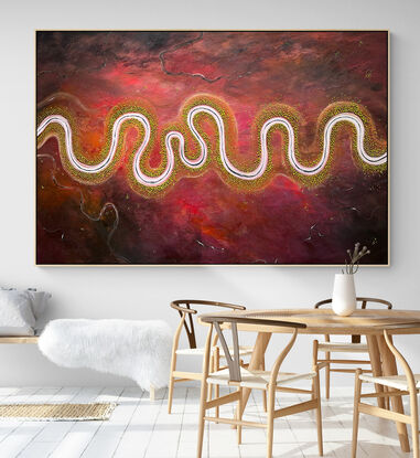 Colourful moody rich textured aerial abstract landscape  in crimson, hot pink and deep chocolate/black tones with meandering river running through the centre.
