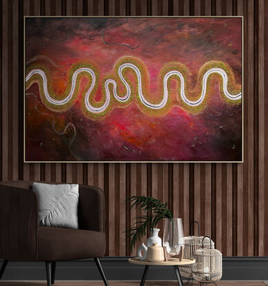 Colourful moody rich textured aerial abstract landscape  in crimson, hot pink and deep chocolate/black tones with meandering river running through the centre.
