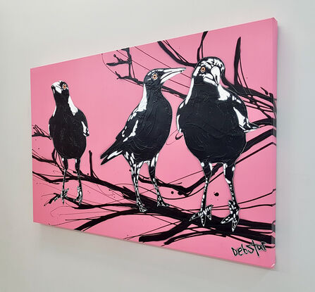 3 magpies on a branch pink background