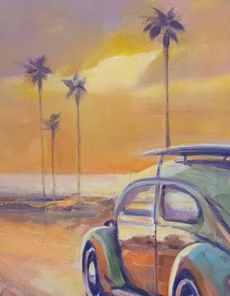 Classic VW Beetle drives towards the sunset