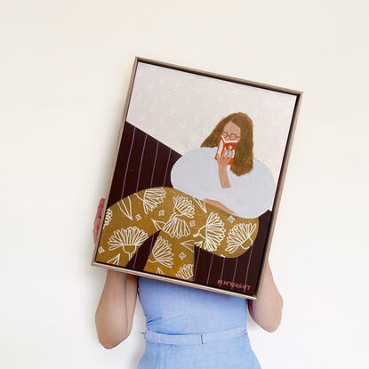 Blue background, woman reading book