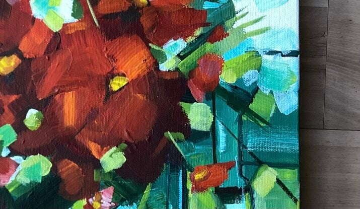 RED coloured flowers in an abstract design. with beautiful warm and cool greens