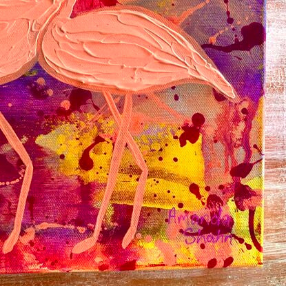 Textured orange flamingos on orange, yellow and purple background