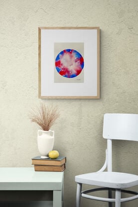 "Celestial Whirl" is a mesmerizing abstract watercolor piece that evokes the beauty and mystery of the cosmos. The artwork features a circular composition with soft gradients of red, blue, and white, blending harmoniously to create a sense of movement and depth. The delicate interplay of colors and the minimalist design invites the viewer to imagine the swirling energy of celestial bodies. This contemporary piece is perfect for those who appreciate abstract interpretations of universal themes and adds a calming, yet vibrant, presence to any space.