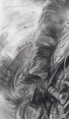 A motorcycle rider drawing in charcoal.