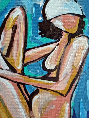 A woman in abstract way on a beach towel 