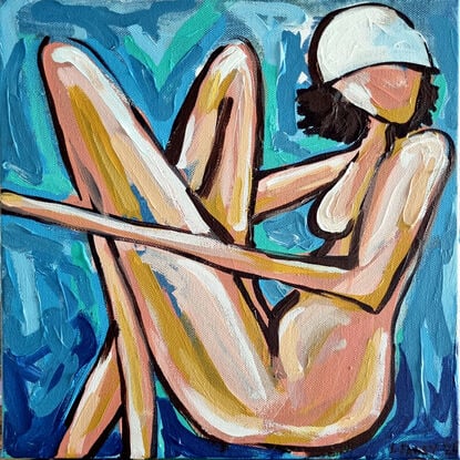 A woman in abstract way on a beach towel 