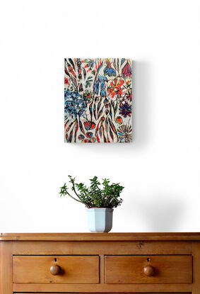 This vibrant, textured painting captures the organic flow of nature with abstract floral forms in bold reds, blues, and earthy tones. The dynamic composition and tactile details create a sense of movement, making it a striking addition to any collection. Perfect for collectors who appreciate nature-inspired abstraction.