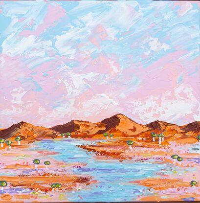 Pink and blue sky with peach toned ranges, tiny trees and a water way through the outback. 