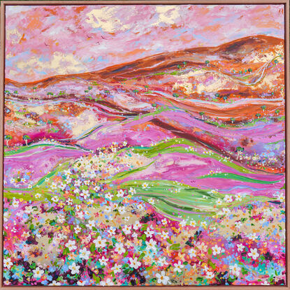 Foreground of wildflowers in a variety of colours in a hilly landscape of pink green and orange with flying birds overhead. 