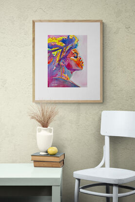 "Vibrant Ascend" is a powerful and dynamic watercolor portrait that captures the striking profile of a woman, bathed in a spectrum of bold, vivid colors. The artwork radiates energy and strength, with the rich interplay of deep blues, fiery reds, and bright yellows creating a sense of movement and intensity. The detailed expression and upward gaze of the subject suggest a journey of empowerment and resilience. This contemporary piece is a celebration of color and form, making it an eye-catching addition to any art collection.