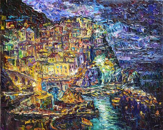 Night landscape of the Italian coast of Amalfi, Sorrento, illuminated by the lights of the night city. Night bay.