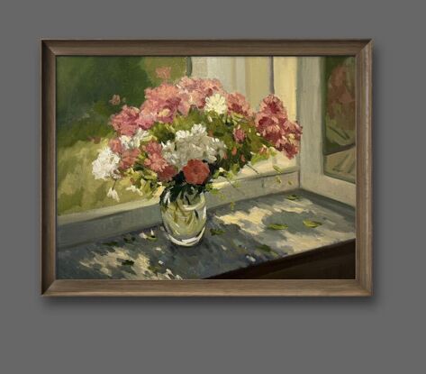 Pink and white flowers on windowsill