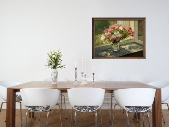 Pink and white flowers on windowsill