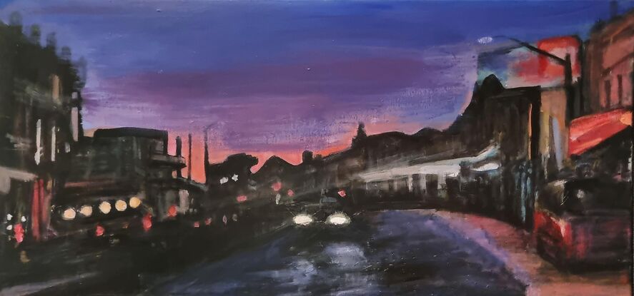 Beneath a fading purple sky, King Street glows in the quiet of dusk. Lights shimmer on the rain-slicked pavement, where headlights and shop signs blur with shadows. The city hums softly as night begins to embrace the day, capturing a moment both alive and dreamlike.