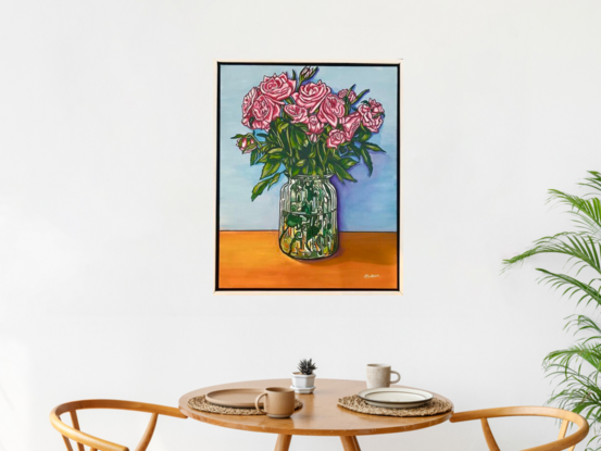 Pink roses in a glass vase, painted in a bright popart/cartoon  style with bright, cheerful light blue ax orange background. Realistic but with a slight cartoon twist in the bright colours and bold outlines. 
Set in a white timber frame that makes the bright colours pop. 