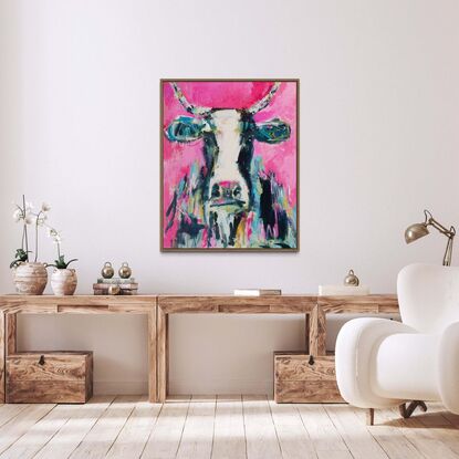 Abstract representation of a cow on large statement piece canvas framed in oak.